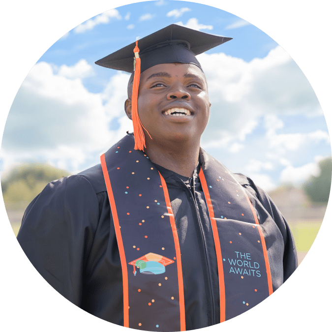 Man Smiling in Graduation Cap